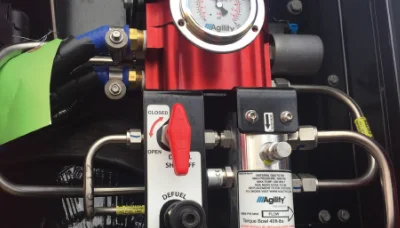 Freightliner Cascadia Natural Gas fueling system components with Agility logo and pressure gauge