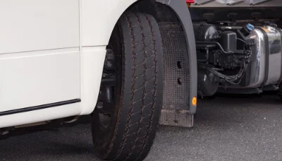 Close-up of Freightliner econicSD truck tire and chassis details