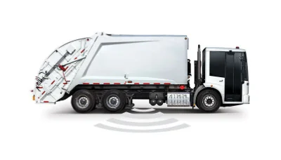 Isolated view of Freightliner econicSD garbage truck on white background