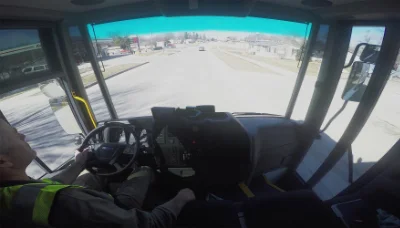 Driver's perspective inside the cab of a Freightliner econicSD on the road