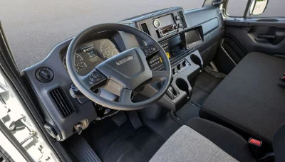 Freightliner M2 112 interior with branded steering wheel and dashboard view