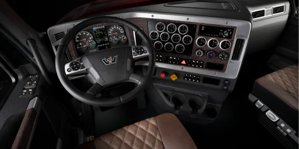 An image of the western star 49X Dash & Cab Interior in X-Series Premium Timber Brown, showing off the premium look and comfort you expect.