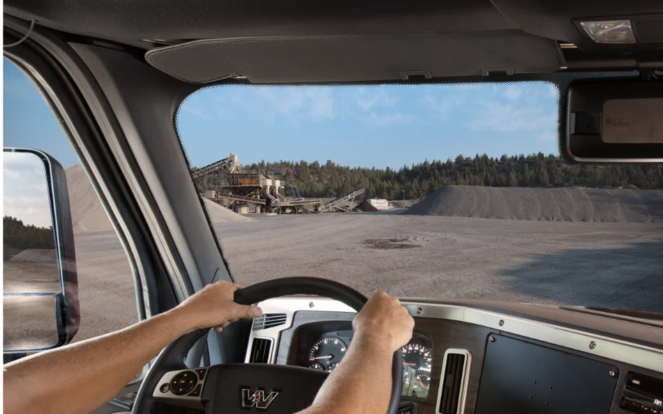 Driver's view from inside a Western Star truck cockpit overlooking a mining site, Ottawa Ontario dealership
