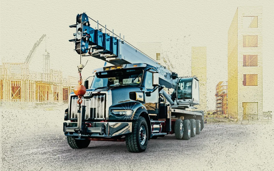 Western Star 49x crane truck with extended boom near under-construction buildings, Ottawa Ontario dealership